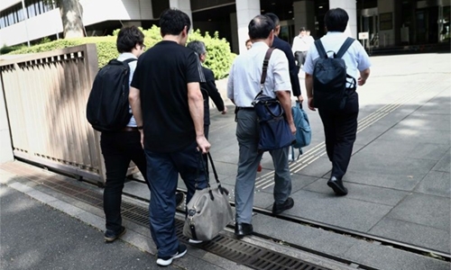 Japan man sues firm for ‘paternity leave harassment’ Japan man sues firm for ‘paternity leave harassment’