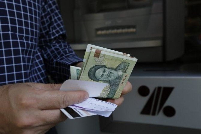 Iranian rial hits record low at 128,000 to US dollar