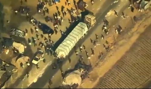 US Drone Footage Shows Hamas Looting Aid Truck in Gaza