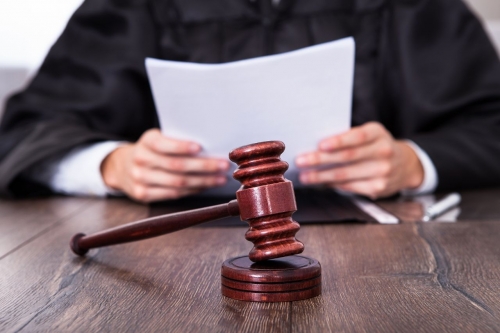 Leniency Saves Defendant from Deportation in Business Licence Case
