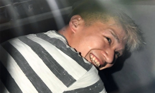 Japan knife attacker grins before cameras