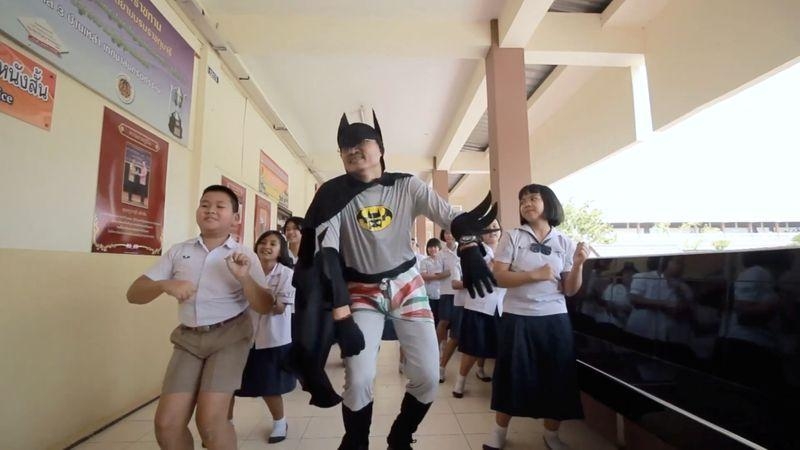 “Corona, corona”: Thai Batman fights virus with catchy tune