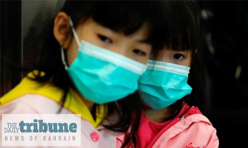 China locks down two cities to curb outbreak