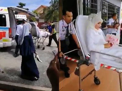 Couple arrives in ambulance for wedding