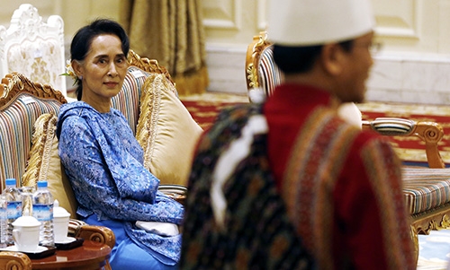 Myanmar's Suu Kyi drops two ministerial jobs, takes on spokeswoman role
