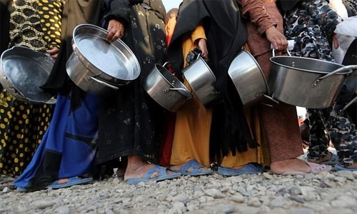 Hundreds sick, two dead in food poisoning at Mosul displaced camp