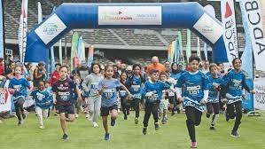 Hundreds of runners brave rain to grant sick kids' wishes in UAE Hundreds of runners brave rain to grant sick kids' wishes in UAE