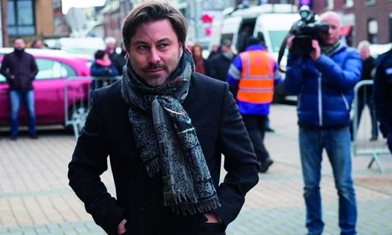 Belgian TV presenter charged with armed robbery Belgian TV presenter charged with armed robbery