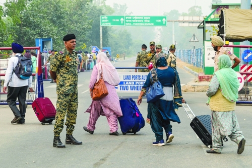 Indian Sikh pilgrims enter Pakistan, first major crossing since May conflict Indian Sikh pilgrims enter Pakistan, first major crossing since May conflict