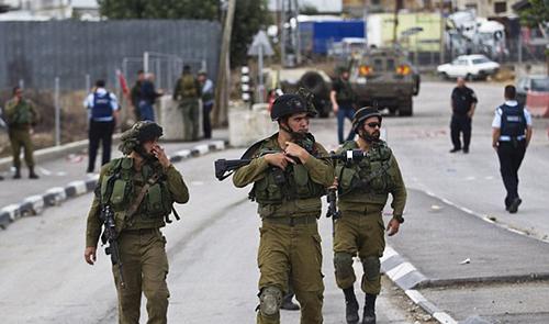 Two Israelis shot, wounded at Hebron holy site