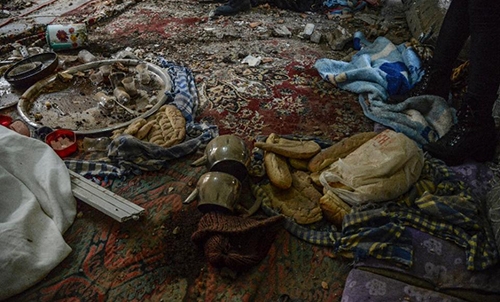 Mother killed by mortar fire in curfew-hit Turkish city Mother killed by mortar fire in curfew-hit Turkish city