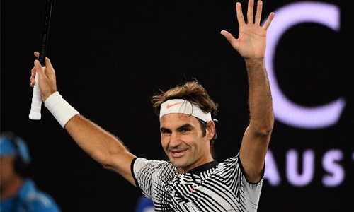 Federer rolls into all-Swiss semi