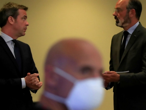 Coronavirus: French police raid ministers' homes in pandemic inquiry