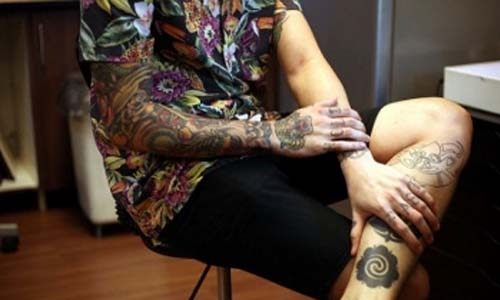 Tattoo ink can seep deep into the body