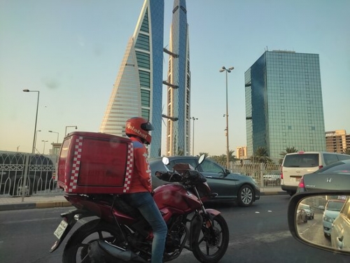 Food delivery riders in Bahrain rush to distribute flood of Iftar orders on time