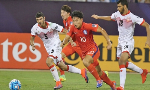 Fighting Bahrainis bow to Koreans Fighting Bahrainis bow to Koreans