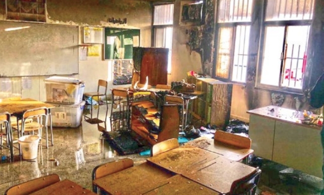 Flames destroy classroom at Hidd school