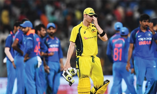 Yadav takes hat-trick  as India beat Aussies