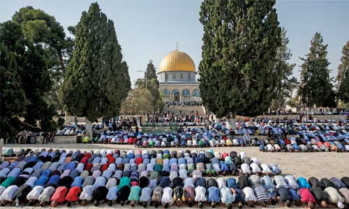 Palestinians  pray outside holy site after restrictions
