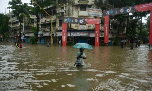 Three dead, dozens feared trapped in Mumbai building collapse