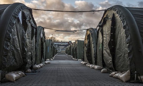 Denmark takes step back on confiscating migrants' cash Denmark takes step back on confiscating migrants' cash