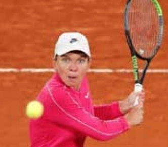 Birthday girl Halep sails through after slow start at French Open Birthday girl Halep sails through after slow start at French Open
