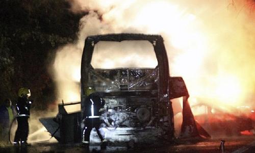 24 killed in fiery bus, car crash in Mexico