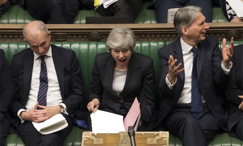 Britain delays Brexit vote Britain delays Brexit vote