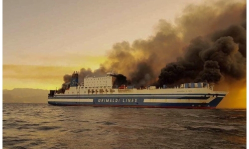 Greek rescuers search burning ferry for 12 missing people