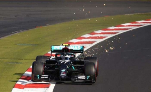 ‘Spot on’ Bottas edges Hamilton to take pole at Eifel GP