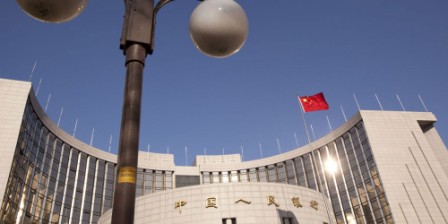 China cuts reserve ratio requirement as growth slows