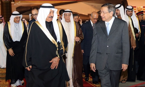 Premier returns from UK