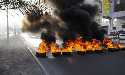 Bahrainis face trial for burning tyres Bahrainis face trial for burning tyres