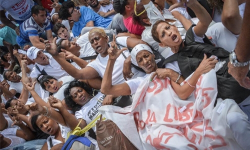 Cuba dissidents arrested hours before Obama arrival