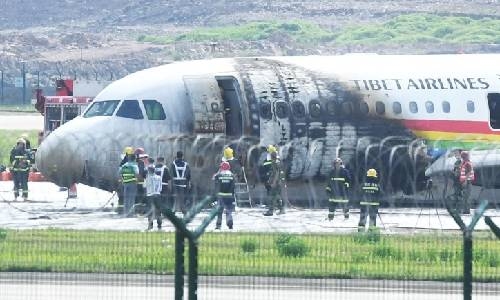 Chinese jet aborts takeoff, catches fire, causing minor injuries