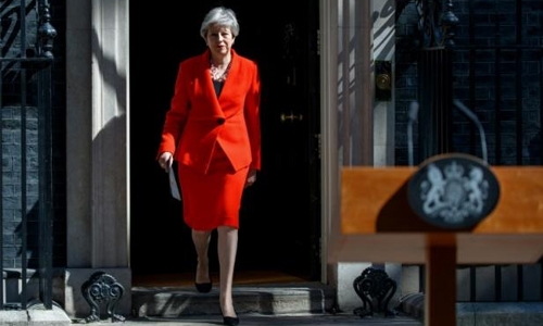 May quits as party leader