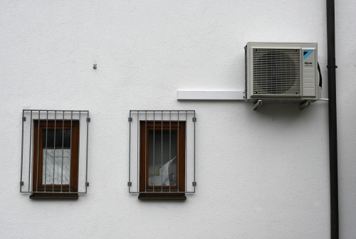 Is an air-conditioned future inevitable in a warming world?