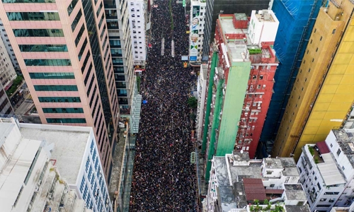 Massive demonstration chokes Hong Kong