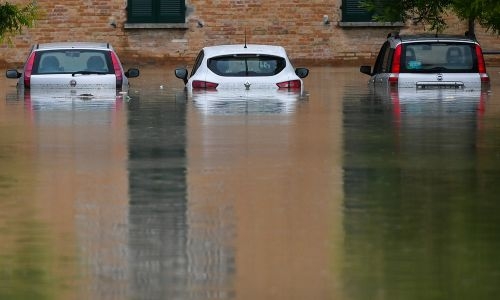 Eight dead, Grand Prix postponed after flooding in northern Italy