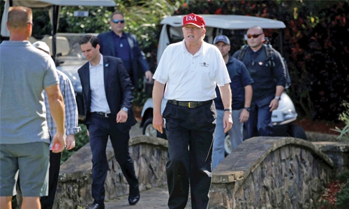 Trump’s vacation: golf, tweets and phone calls