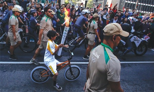 Protesters in Brazil halt Olympic torch relay, put out flame
