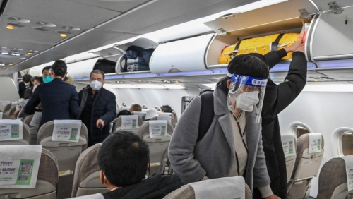 WHO urges travellers to wear masks as new Covid-19 variant spreads WHO urges travellers to wear masks as new Covid-19 variant spreads