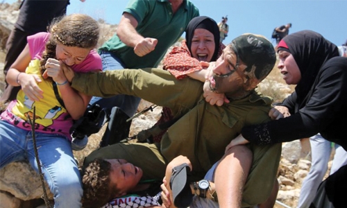 Palestinian women in court over slap video