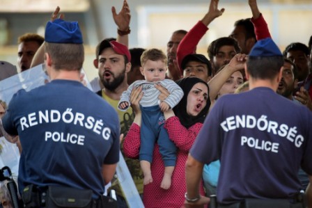 Migrants overrun police at flashpoint border crossing, entering Hungary Migrants overrun police at flashpoint border crossing, entering Hungary