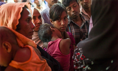 Two thousand Rohingya mass on Myanmar coast to join exodus Two thousand Rohingya mass on Myanmar coast to join exodus