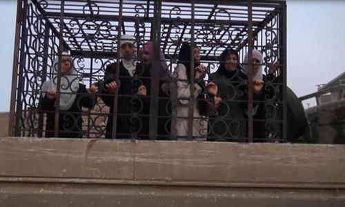 Syria rebels using caged captives as 'human shields'