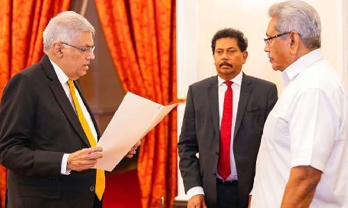 Sri Lanka’s new PM struggles to form unity government