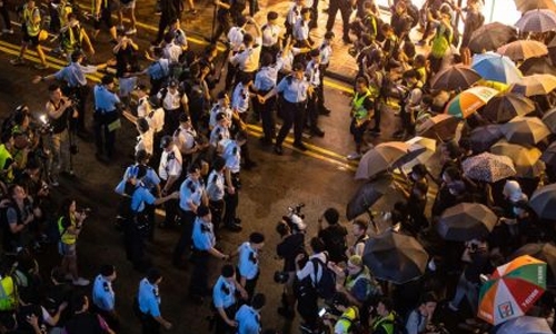 Clashes in HK after huge march to China station