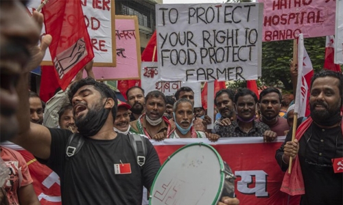 India’s farmers renew protests, challenging Modi government