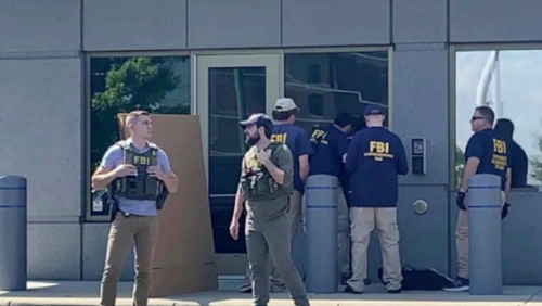 Armed man killed after trying to breach FBI office, standoff Armed man killed after trying to breach FBI office, standoff